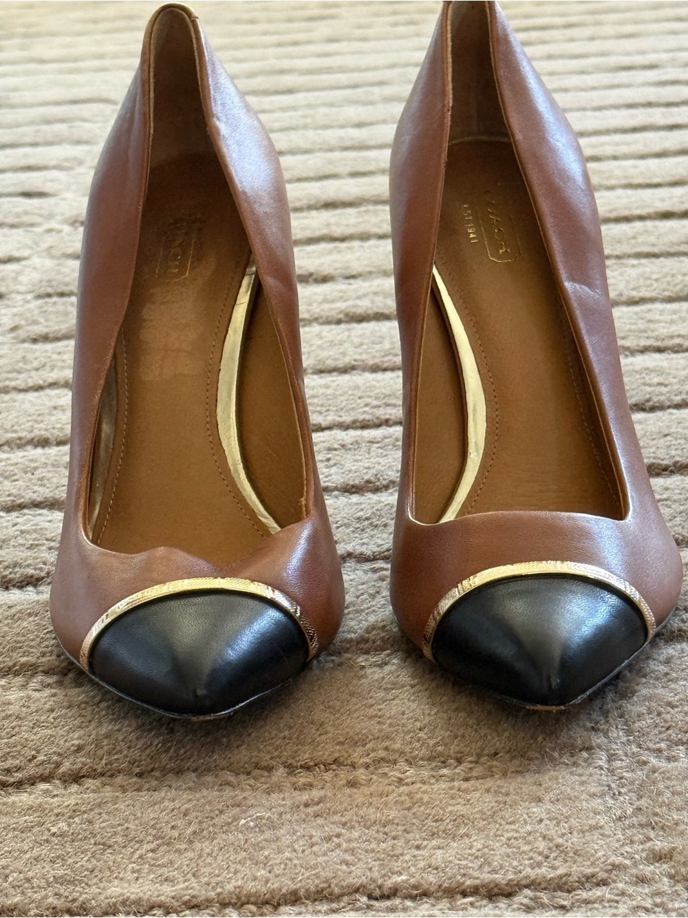 Coach Brown Leather Pumps with Black Cap Toe and Gold Accent